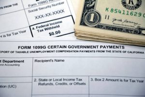 Closeup of overlapping tax forms, Form 1099G